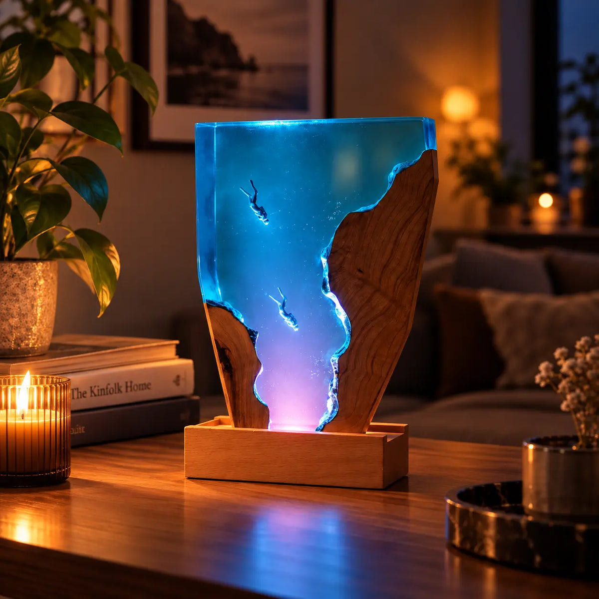 Double Dive epoxy resin lamp glowing on a living room table at night – Woodiny