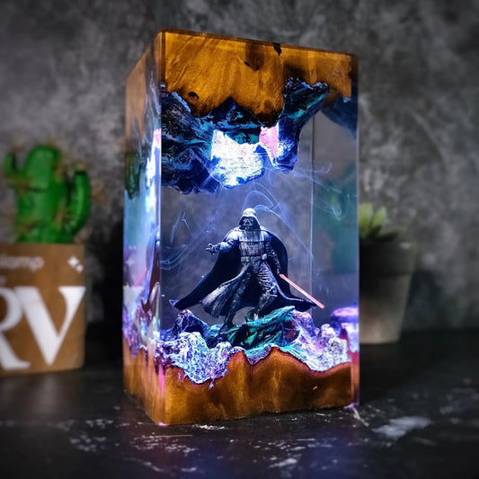 Lone Warrior resin lamp glowing blue and purple on a dark desk – Woodiny