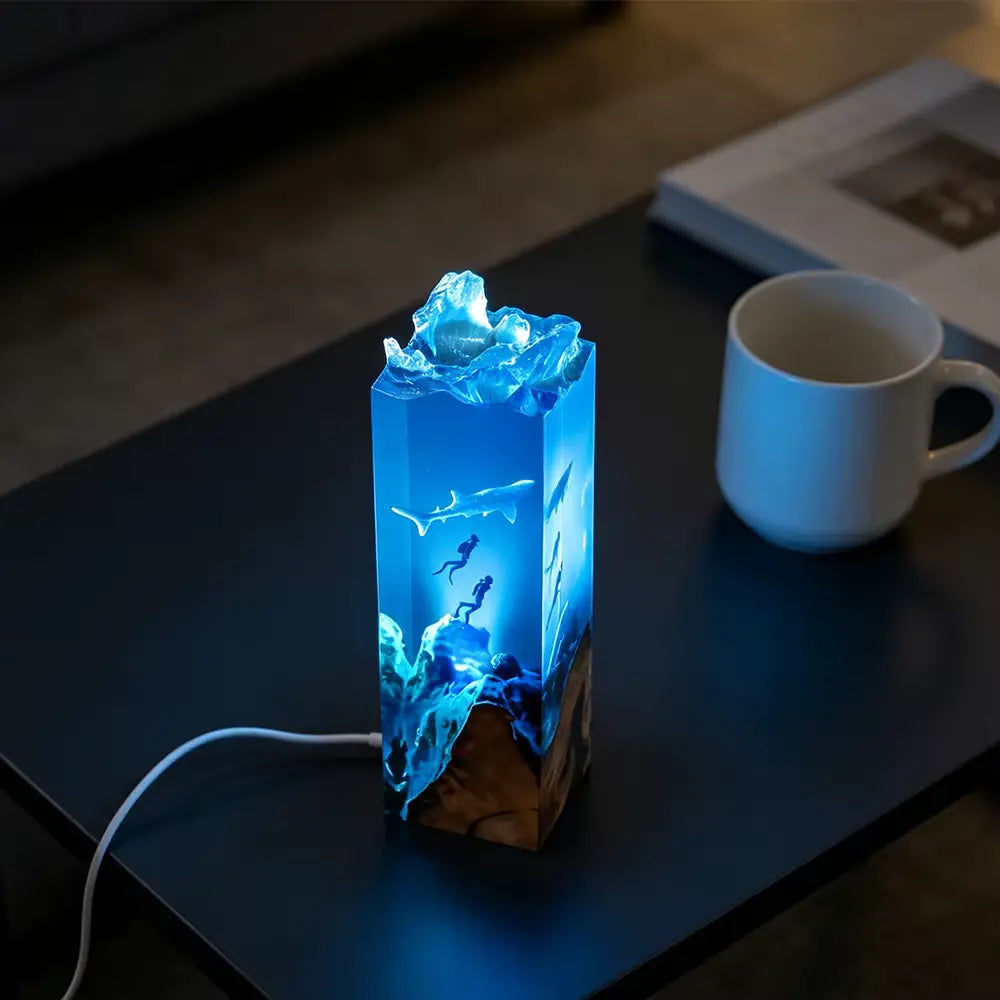Glow in the dark sea foam on natural driftwood inside the whale shark resin lamp